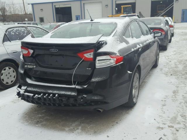 3FA6P0H74FR107977 - 2015 FORD FUSION SE BLACK photo 4