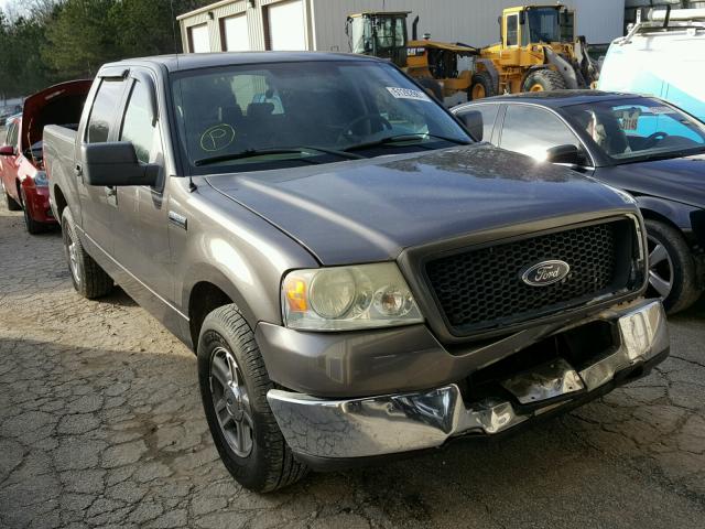 1FTPW12505KF10517 - 2005 FORD F150 SUPER GRAY photo 1