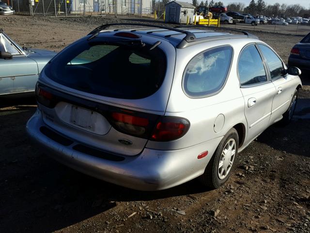 1FAFP57S8WA205259 - 1998 FORD TAURUS SE SILVER photo 4