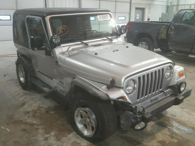 1J4FA49S24P721009 - 2004 JEEP WRANGLER / SILVER photo 1