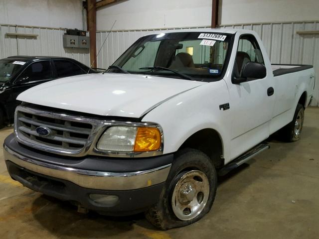 2FTRF18234CA37382 - 2004 FORD F-150 HERI WHITE photo 2