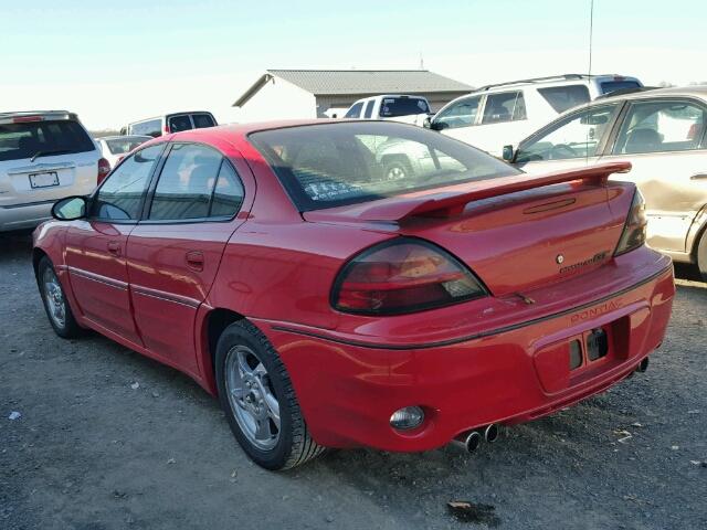 1G2NW52E32C297572 - 2002 PONTIAC GRAND AM G RED photo 3