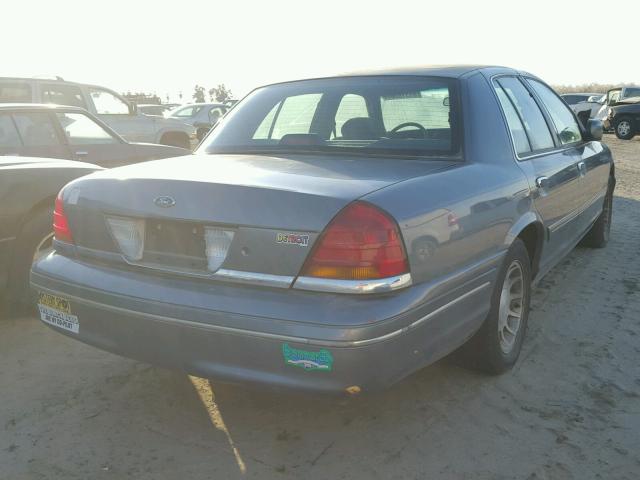 2FAFP74W3XX178077 - 1999 FORD CROWN VICT GRAY photo 4