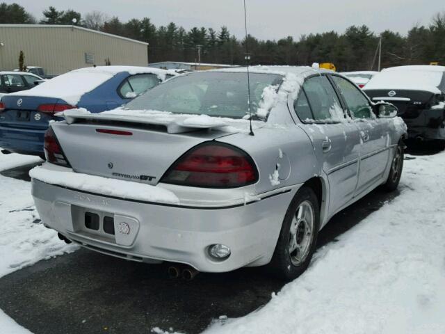 1G2NV52EX2M653948 - 2002 PONTIAC GRAND AM G SILVER photo 4