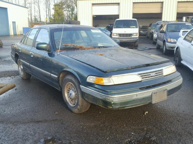 2FALP74W5PX141289 - 1993 FORD CROWN VICT GREEN photo 1