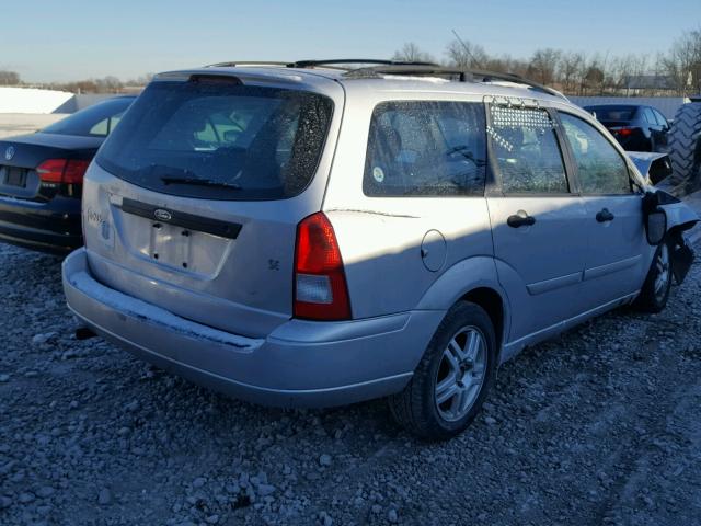 1FAHP36P9YW216271 - 2000 FORD FOCUS SE SILVER photo 4