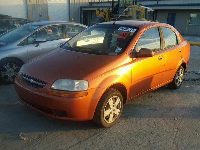 KL1TD56636B595487 - 2006 CHEVROLET AVEO BASE ORANGE photo 2