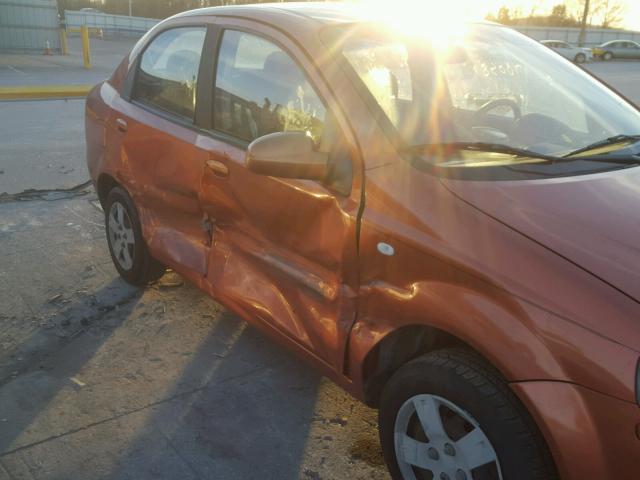 KL1TD56636B595487 - 2006 CHEVROLET AVEO BASE ORANGE photo 9