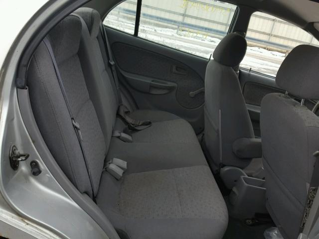 KNADC125946290584 - 2004 KIA RIO SILVER photo 6