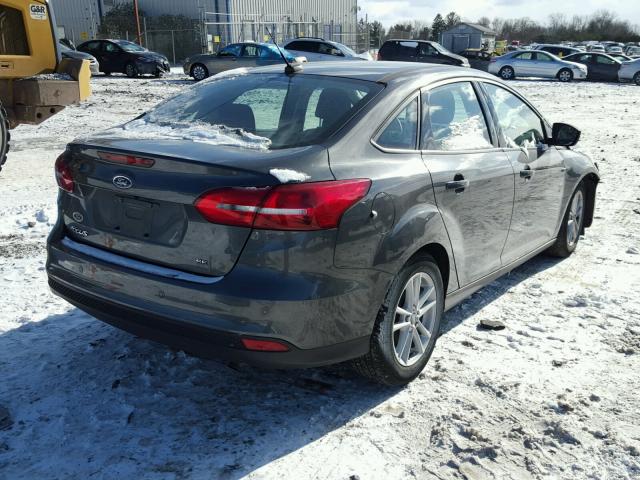 1FADP3F2XFL213848 - 2015 FORD FOCUS SE GRAY photo 4