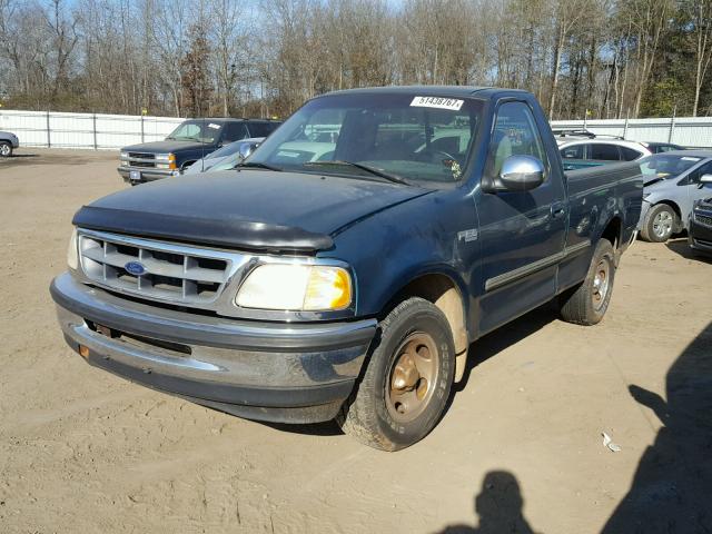 1FTDF172XVNC37196 - 1997 FORD F150 GREEN photo 2