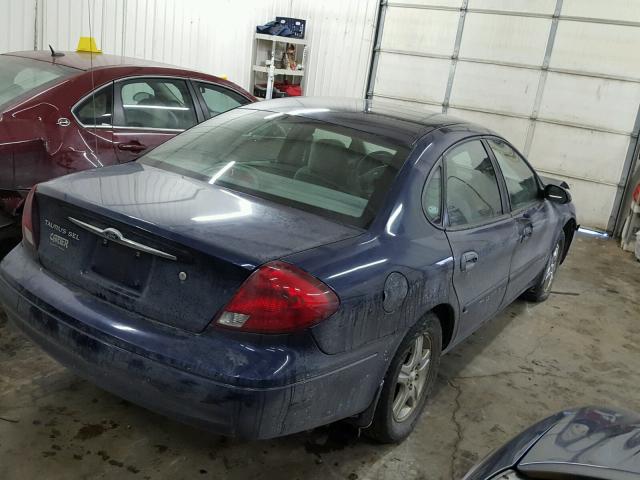 1FAFP56S8YG270324 - 2000 FORD TAURUS SEL BLUE photo 4