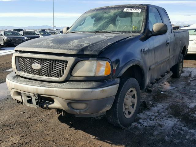 2FTPX28L7XCA38297 - 1999 FORD F250 BLACK photo 2