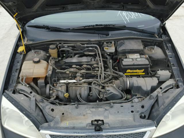 1FAFP34N95W155315 - 2005 FORD FOCUS ZX4 BLACK photo 7