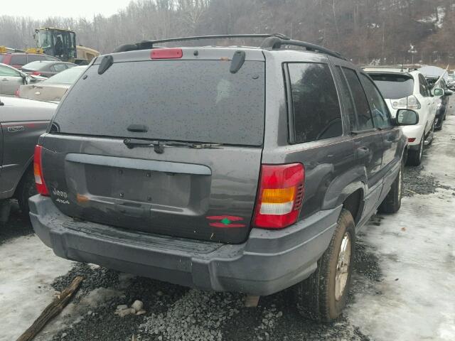 1J4GW48S84C237764 - 2004 JEEP GRAND CHER GRAY photo 4