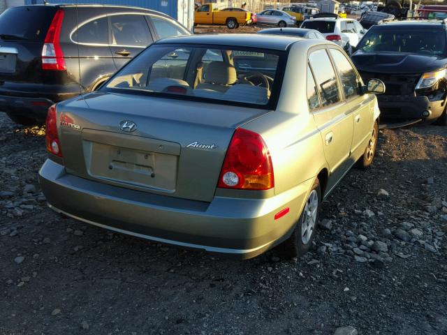 KMHCG45CX3U464313 - 2003 HYUNDAI ACCENT GREEN photo 4