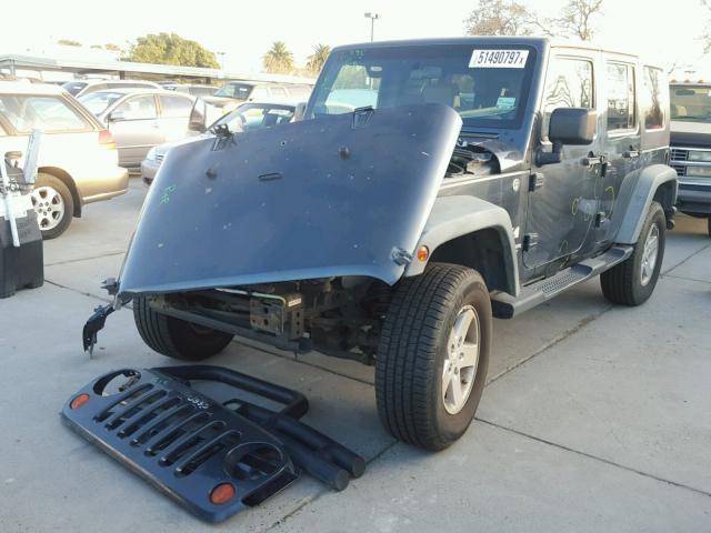 1J4GA39138L546725 - 2008 JEEP WRANGLER U GRAY photo 2