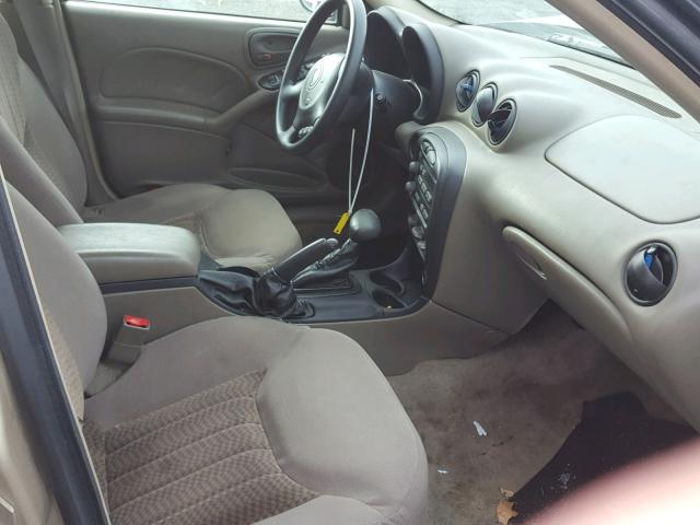 1G2NF52E74C132823 - 2004 PONTIAC GRAND AM S GOLD photo 5