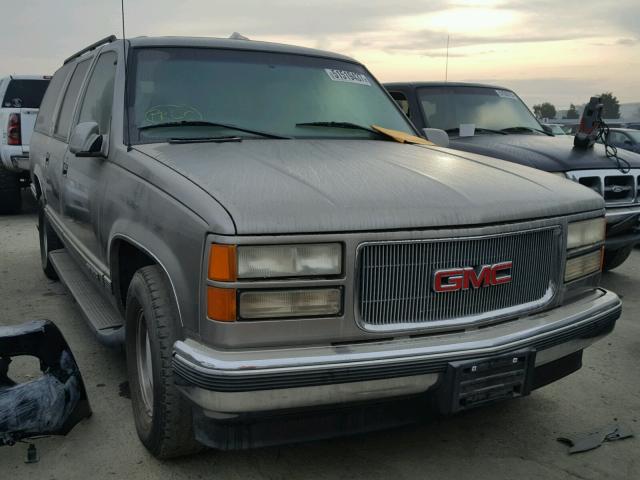 1GKEC16R0XJ713854 - 1999 GMC SUBURBAN C BLACK photo 1