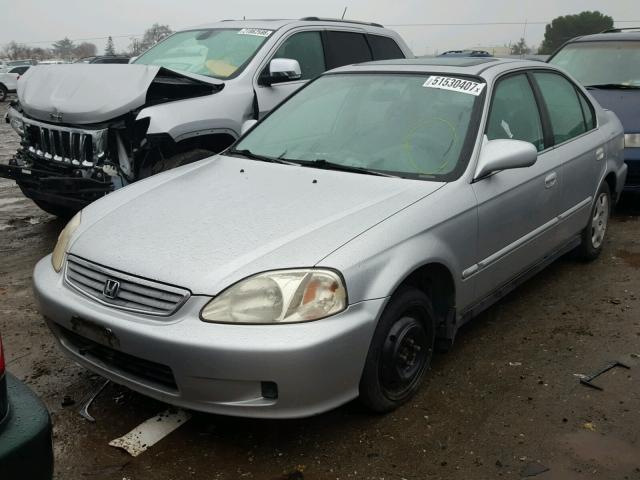 2HGEJ8545XH565574 - 1999 HONDA CIVIC EX SILVER photo 2