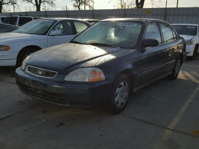 2HGEJ6677VH576778 - 1997 HONDA CIVIC LX GREEN photo 2