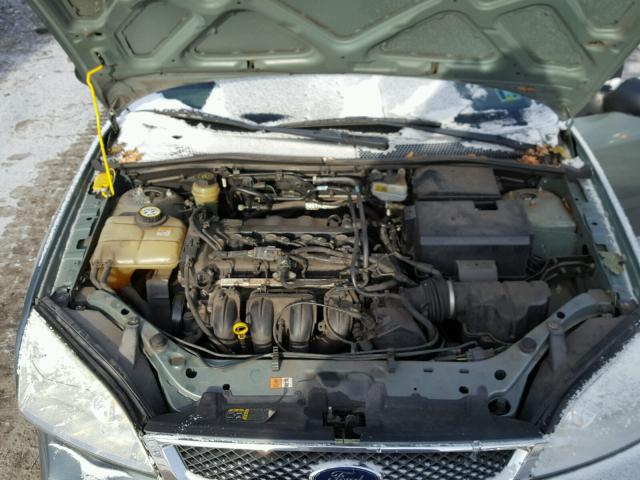 1FAFP34N75W313294 - 2005 FORD FOCUS ZX4 GREEN photo 7