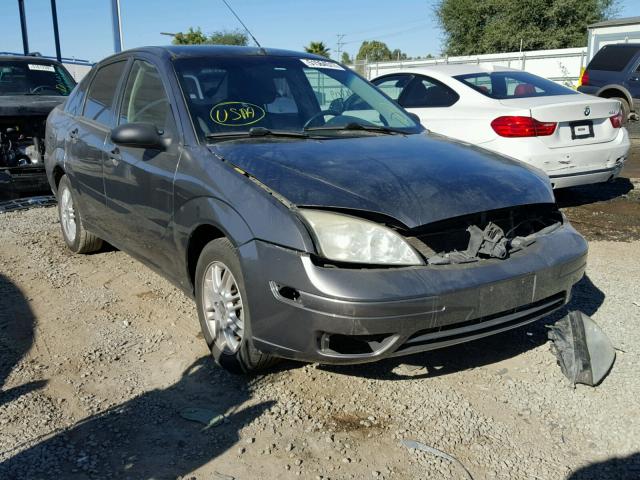 1FAHP34N45W284314 - 2005 FORD FOCUS ZX4 GRAY photo 1