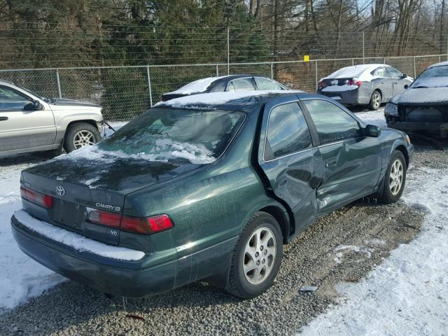 JT2BF28K9X0189128 - 1999 TOYOTA CAMRY LE GREEN photo 4