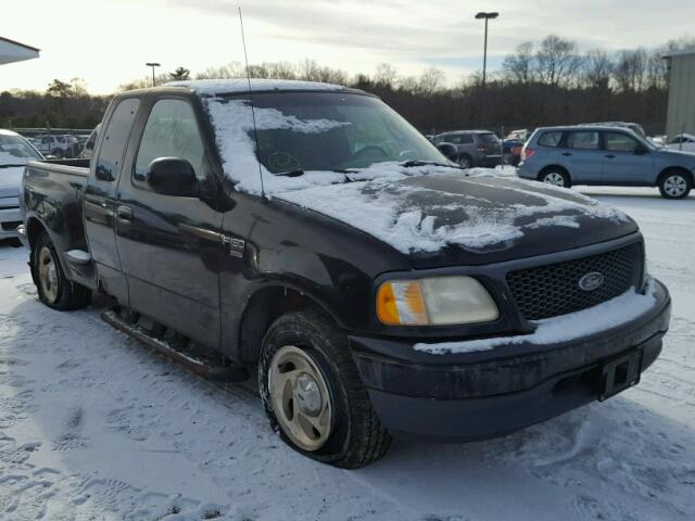 2FTRX07L7YCA01492 - 2000 FORD F150 BLACK photo 1