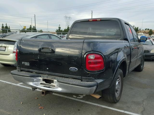 1FTRW07L81KE39233 - 2001 FORD F150 SUPER BLACK photo 4