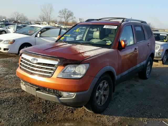 KNDJJ741095027678 - 2009 KIA BORREGO LX ORANGE photo 2