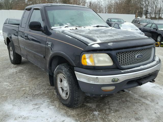 1FTRX18L7XNB00911 - 1999 FORD F150 BLACK photo 1