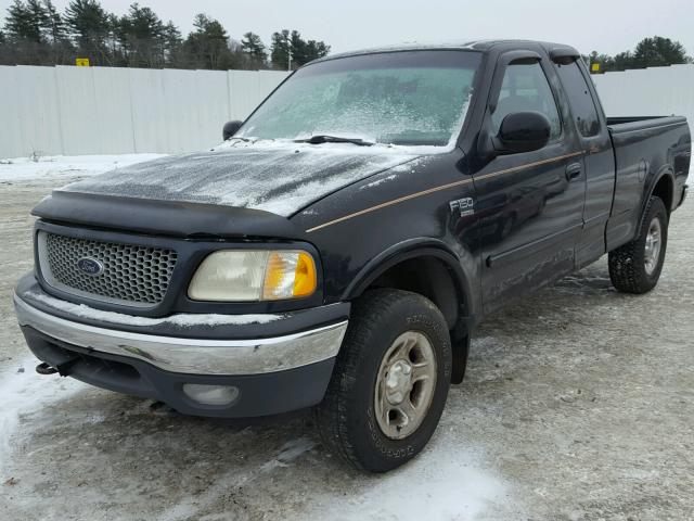 1FTRX18L7XNB00911 - 1999 FORD F150 BLACK photo 2