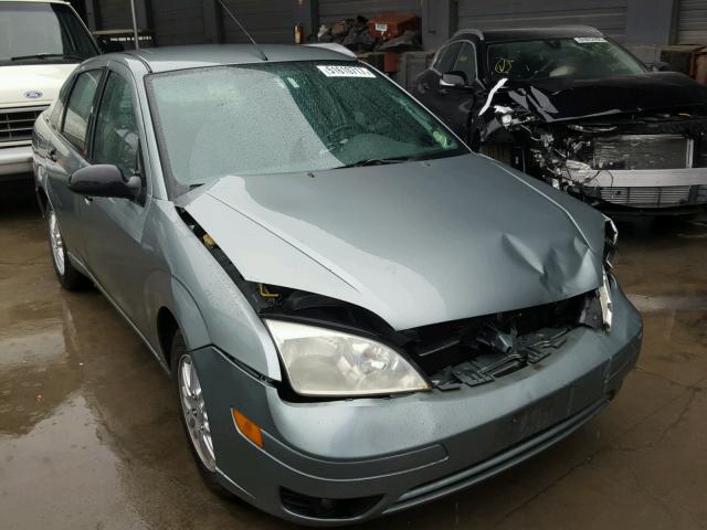 1FAFP34N05W153968 - 2005 FORD FOCUS ZX4 GREEN photo 1