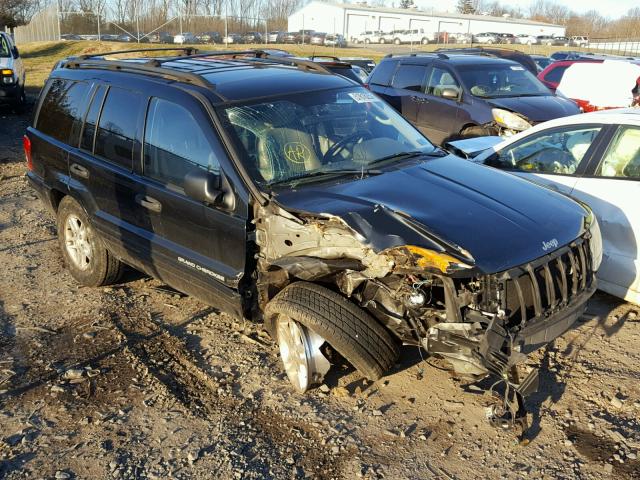 1J4GW48N84C415943 - 2004 JEEP GRAND CHER BLACK photo 1