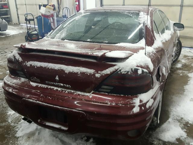 1G2NF52T5YC539916 - 2000 PONTIAC GRAND AM S RED photo 4