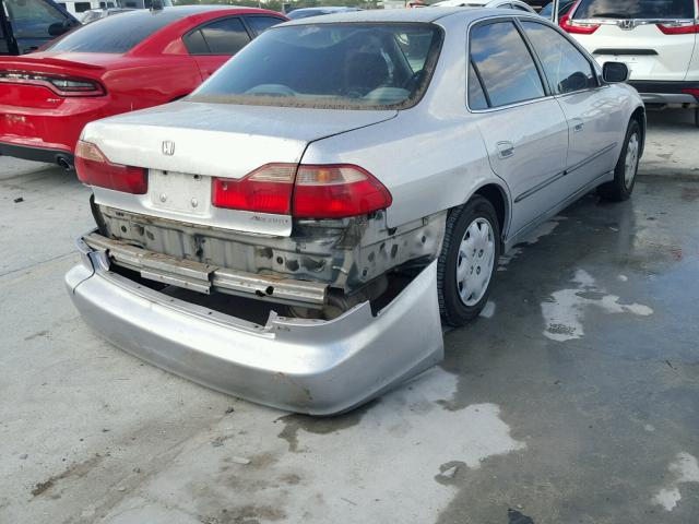 1HGCG6653XA148874 - 1999 HONDA ACCORD LX SILVER photo 4