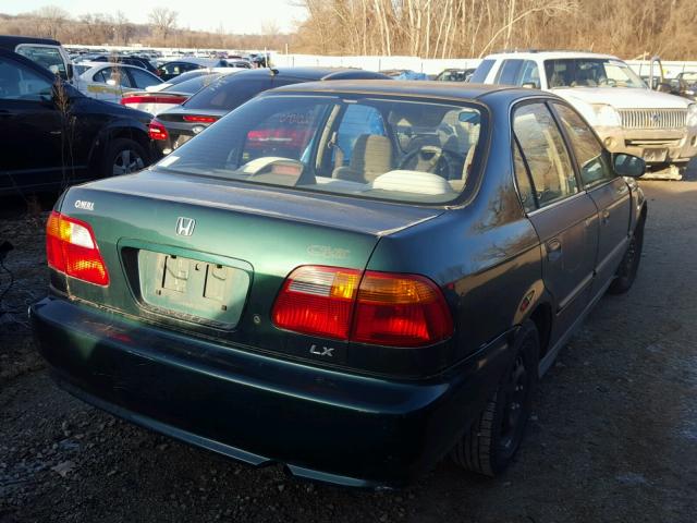 1HGEJ6673XL048323 - 1999 HONDA CIVIC LX GREEN photo 4