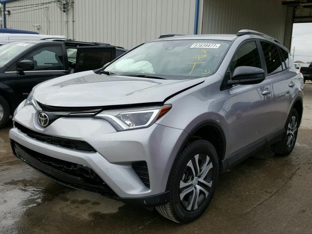 2T3ZFREV5HW405177 - 2017 TOYOTA RAV4 LE SILVER photo 2