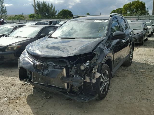 2T3ZFREV8GW247352 - 2016 TOYOTA RAV4 LE BLACK photo 2