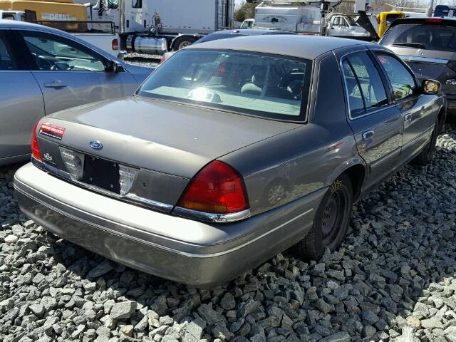 2FAFP73W2XX125677 - 1999 FORD CROWN VICT SILVER photo 4