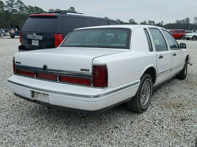 1LNLM81W0VY673345 - 1997 LINCOLN TOWN CAR E WHITE photo 4