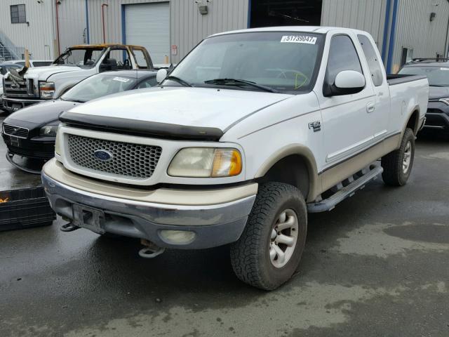 1FTRX18L7XNA11677 - 1999 FORD F150 GOLD photo 2