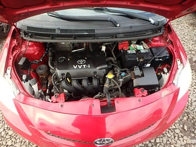 JTDBT903271044620 - 2007 TOYOTA YARIS RED photo 7