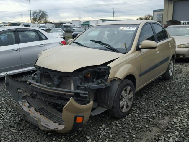 KNADE223496470660 - 2009 KIA RIO BASE GOLD photo 2