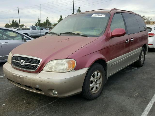 KNDUP131146579137 - 2004 KIA SEDONA EX RED photo 2