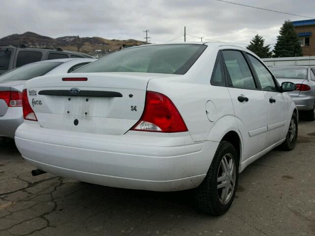 1FAFP34P21W297260 - 2001 FORD FOCUS SE WHITE photo 4