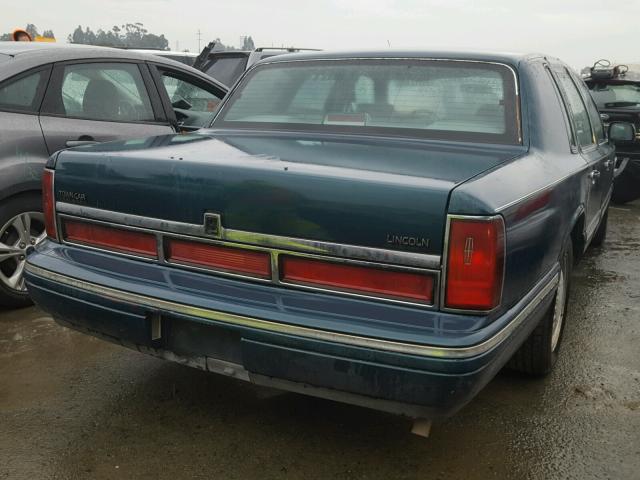 1LNLM82W9VY654808 - 1997 LINCOLN TOWN CAR S BLUE photo 4