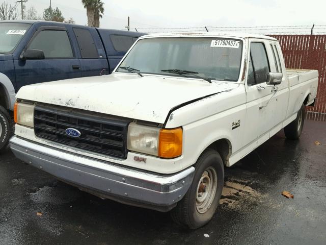 1FTEX15N8HKB28885 - 1987 FORD F150 WHITE photo 2