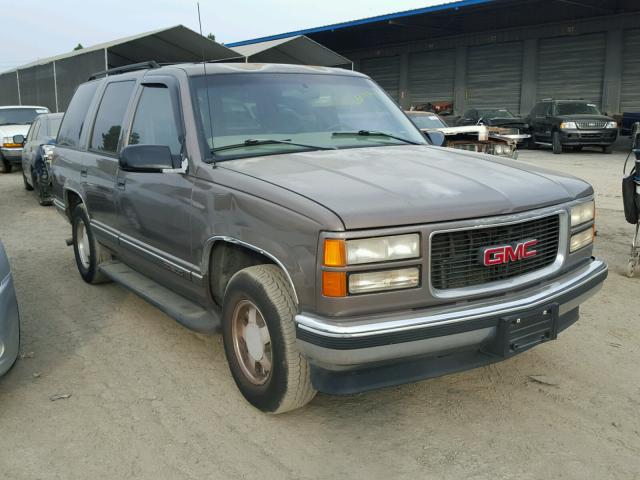 1GKEC13RXWJ702895 - 1998 GMC YUKON BROWN photo 1